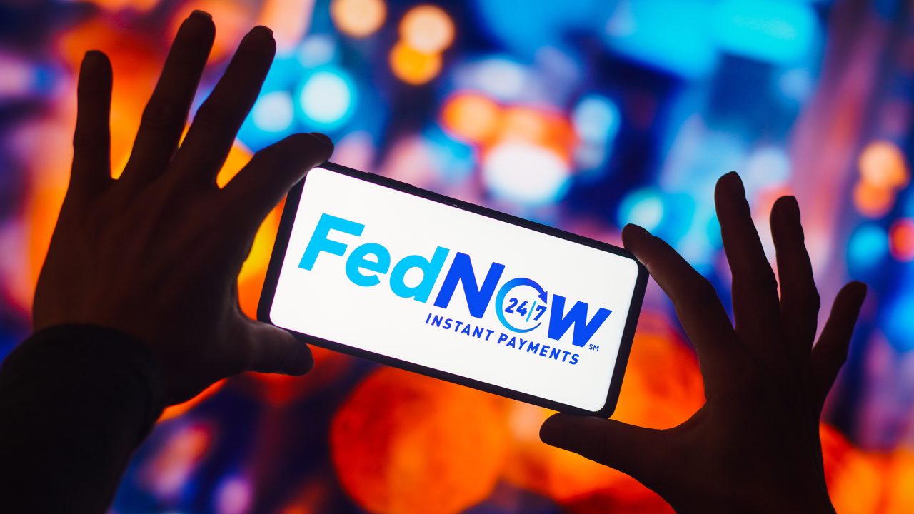 In this photo illustration, the FedNow Service logo is
